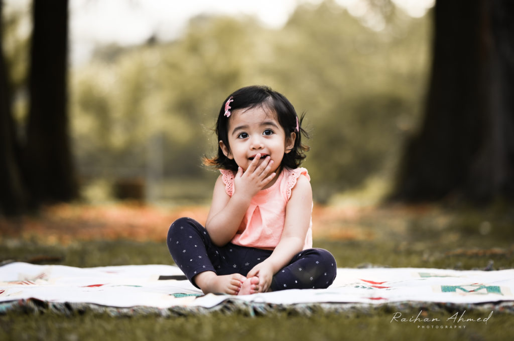 Toddler with mischievous face