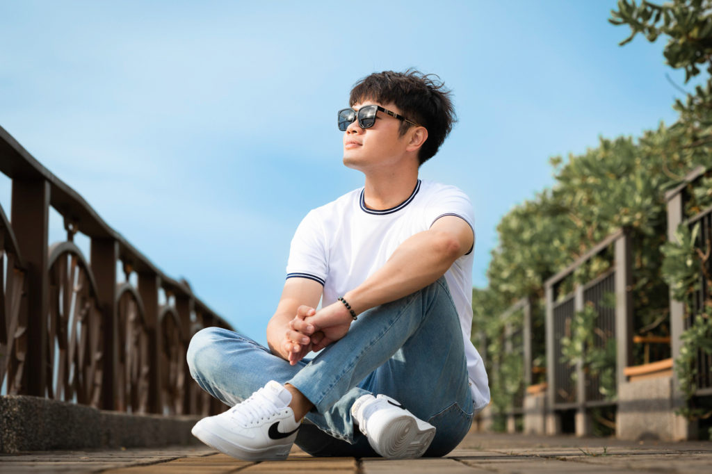 Man sitting down looking at view