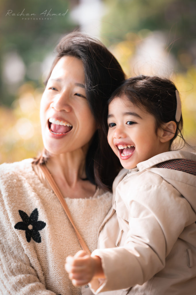 Photo of a mother and daughter smiling