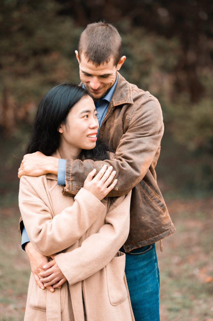 Photo of a man looking lovingly at his girlfriend