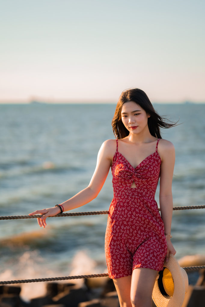 Girl at the seaside with ocean background