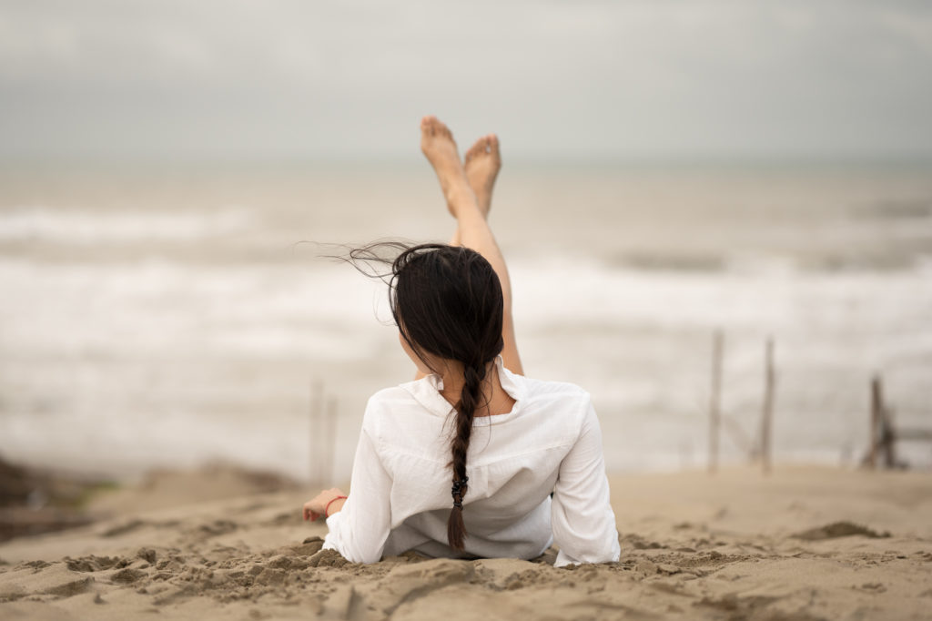 Woman with both feet in the air