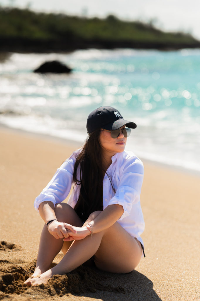 Woman looking beyond with ocean background