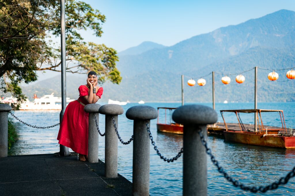 Women smiling with lake background