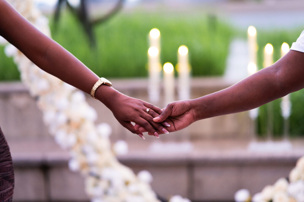 Couple holding hands